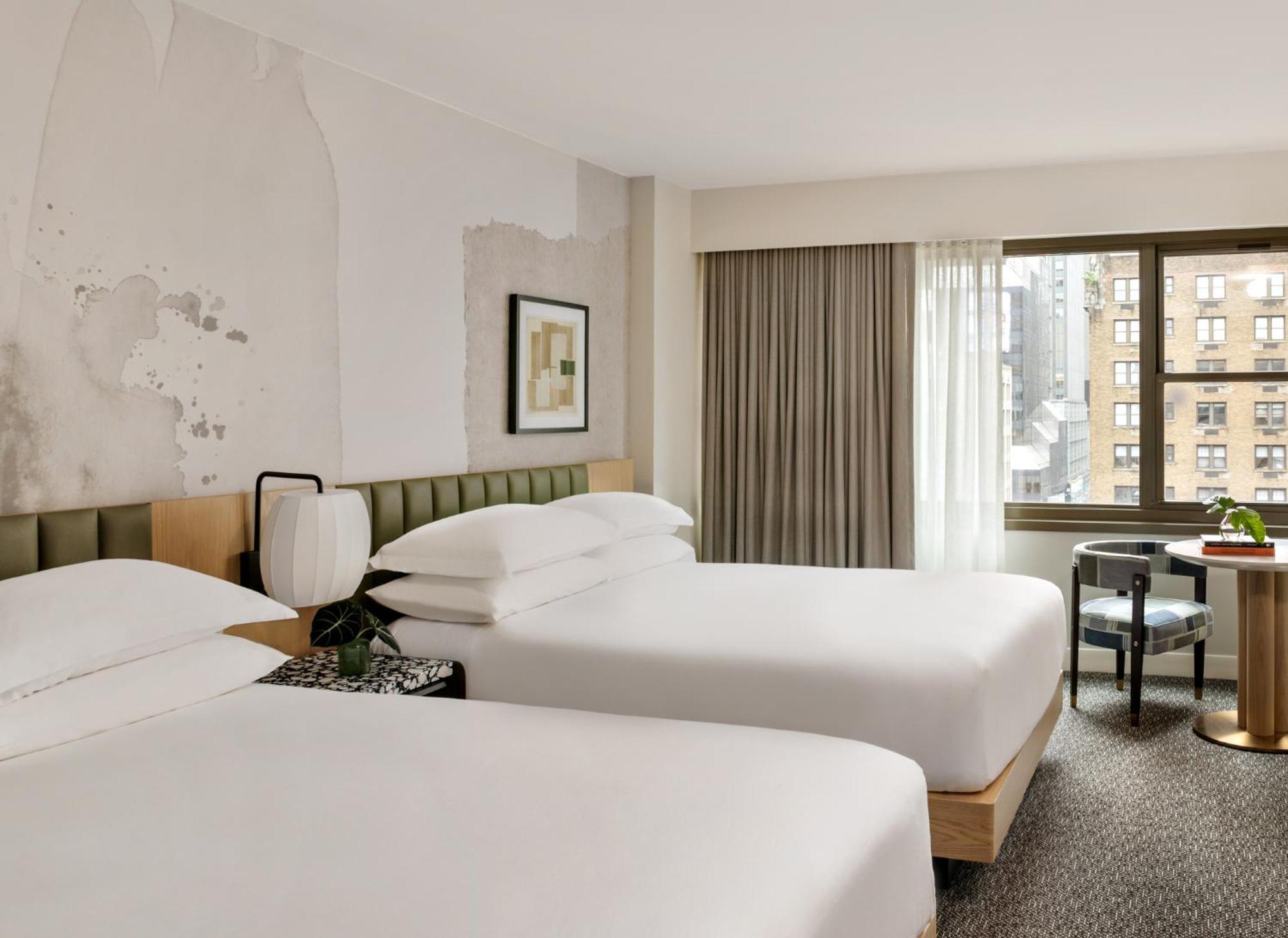 Kimpton Theta New York - Times Square By Ihg Hotel Ngoại thất bức ảnh A guest room at the hotel