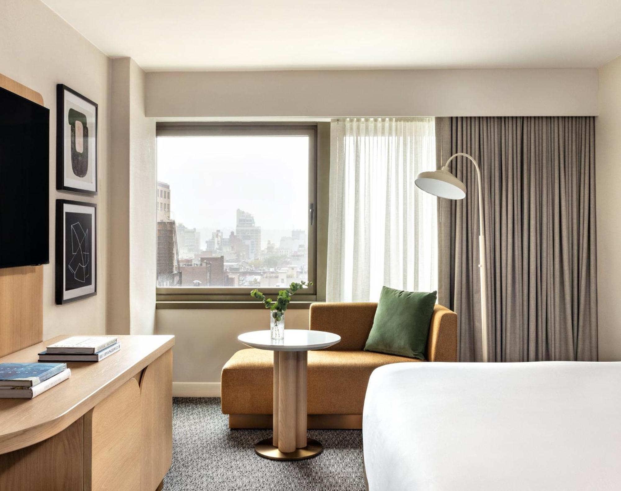 Kimpton Theta New York - Times Square By Ihg Hotel Ngoại thất bức ảnh A guest room at the Hotel Commonwealth
